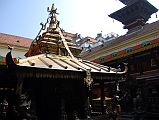 Kathmandu Patan Golden Temple 10 Swayambhu Chaitya With Entrance Doorway To The Right 